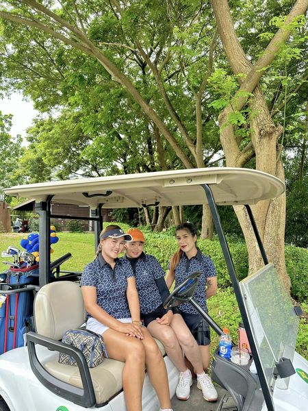 สนามกอล์ฟหริภุญชัย กอล์ฟคลับ 2 people people golfing golf cart golf course and text