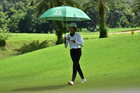 Alpinegolfresort Chiangmai 1 person golfing golf course and text