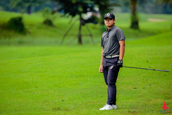 Alpinegolfresort Chiangmai 1 person golfing golf course and text-3