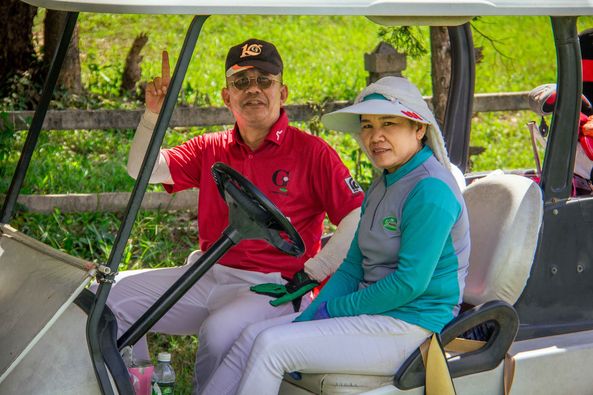 Gassan Khuntan Golf amp Resort Thailand nbsp 2 people people golfing golf cart and golf course-5