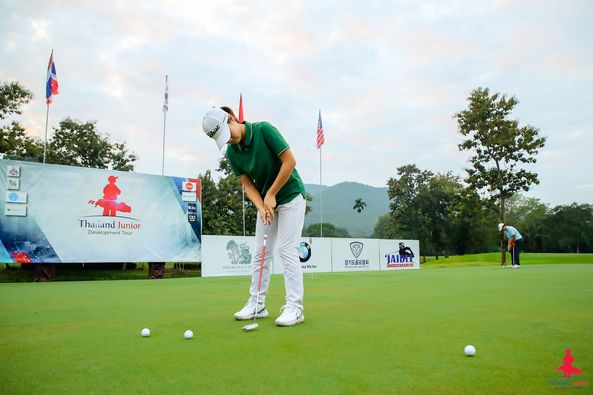 Alpinegolfresort Chiangmai nbsp 2 people people golfing golf course and text