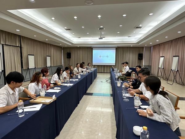 Alpinegolfresort Chiangmai nbsp 11 people people studying table dais and text