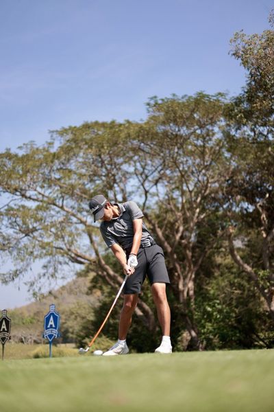 Alpinegolfresort Chiangmai nbsp 1 person golfing golf course and text-4