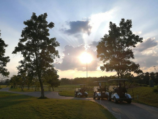 สนามกอล์ฟหริภุญชัย กอล์ฟคลับ nbsp 2 people people golfing golf cart twilight and golf course