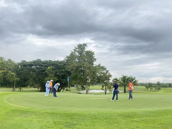 5 people people playing sports golf course and grass 5 people people playing sports golf course and grass
