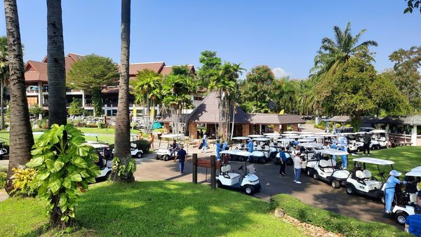 Summit Green Valley Chiangmai Country Club 4 people outdoors and palm trees Summit Green Valley Chiangmai Country Club 4 people outdoors and palm trees