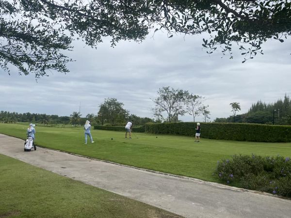 สนามกอล์ฟหริภุญชัย กอล์ฟคลับ 4 people people standing grass and golf course สนามกอล์ฟหริภุญชัย กอล์ฟคลับ 4 people people standing grass and golf course