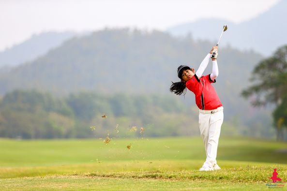 Alpinegolfresort Chiangmai 1 person golfing grass and nature Alpinegolfresort Chiangmai 1 person golfing grass and nature