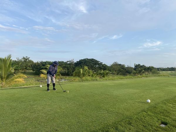 สนามกอล์ฟหริภุญชัย กอล์ฟคลับ 1 person playing a sport and grass สนามกอล์ฟหริภุญชัย กอล์ฟคลับ 1 person playing a sport and grass