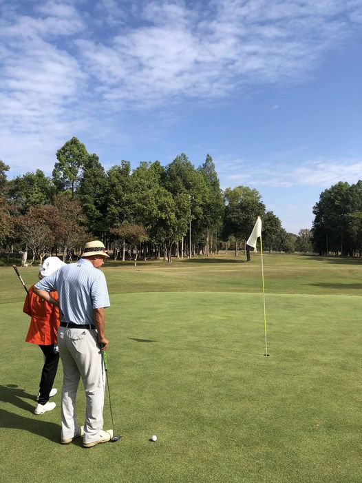 Lanna Golf Club 2 people golf course and grass
