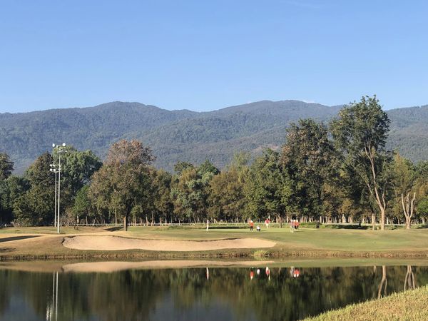 Lanna Golf Club 5 people grass golf course and nature