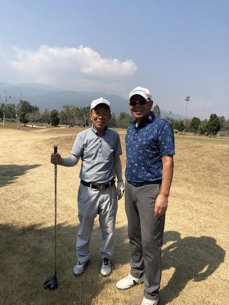 Lanna Golf Club 2 people people standing and grass