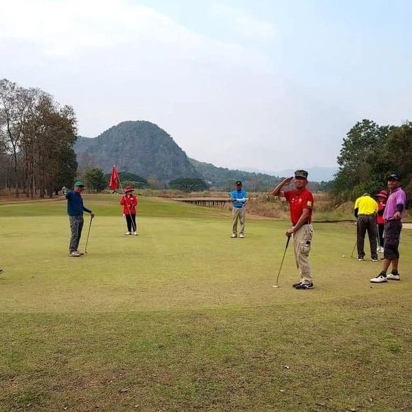 Maekok golf course 6 people people standing people playing sports and grass