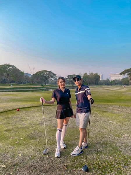 Stardome Golf Club 2 people people standing and outdoors