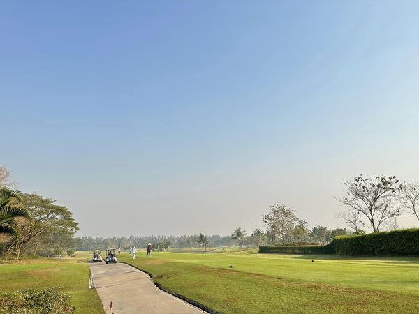 สนามกอล์ฟหริภุญชัย กอล์ฟคลับ 3 people grass golf course sky nature and tree