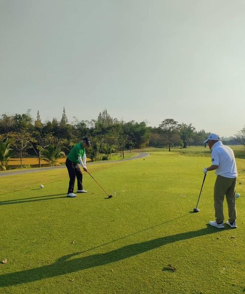 สนามกอล์ฟหริภุญชัย กอล์ฟคลับ 2 people people playing sports and grass