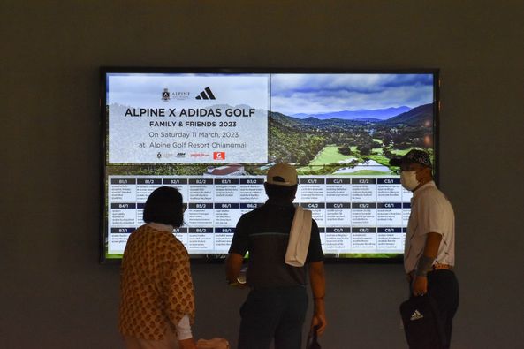 Alpinegolfresort Chiangmai 3 people people standing and screen
