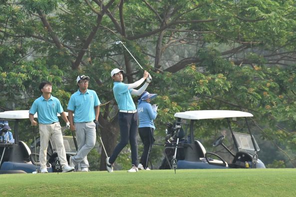 Alpinegolfresort Chiangmai 4 people people golfing golf cart and golf course