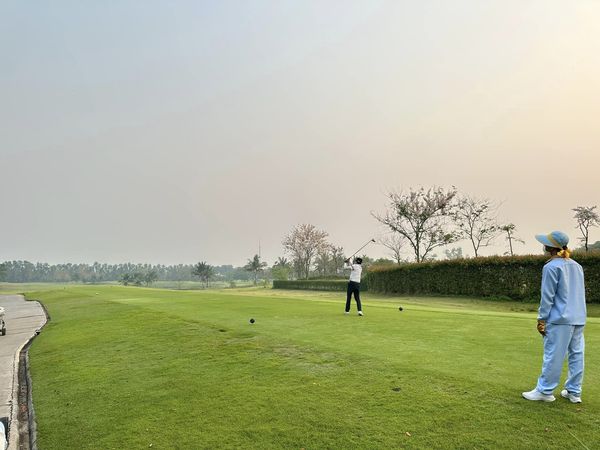สนามกอล์ฟหริภุญชัย กอล์ฟคลับ 2 people people golfing and golf course