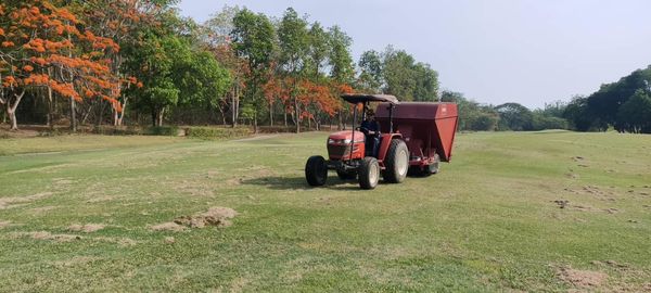 Alpinegolfresort Chiangmai golf cart combine grass and golf course