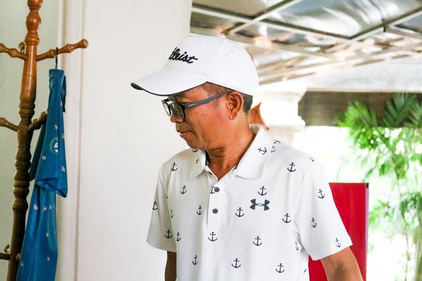 Gassan Khuntan Golf amp Resort Thailand 1 person golfing hat and golf course