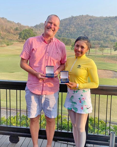 Banyan Golf Club Hua Hin 2 people people standing and golf course