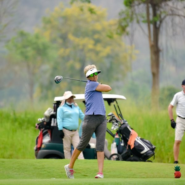 Banyan Golf Club Hua Hin 2 people people golfing and golf course