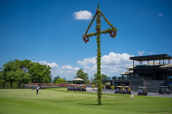 Black Mountain Golf Club 3 people people golfing golf cart tree and golf course