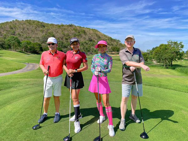 Banyan Golf Club Hua Hin 4 people people golfing and golf course