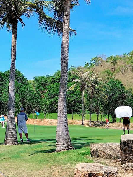 Banyan Golf Club Hua Hin 4 people people golfing grass and golf course