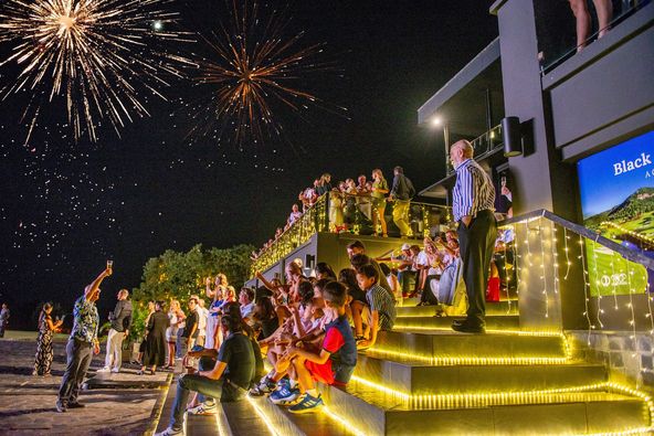 Black Mountain Golf Club nbsp 6 people fireworks crowd and text