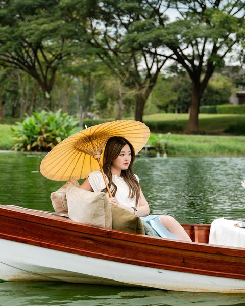 1 person sitting and body of water 1 person sitting and body of water