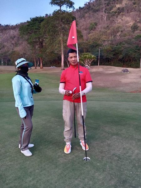 Khao Yai Country Club 2 people and golf course