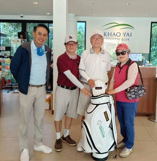 Khao Yai Country Club 4 people people standing and KHAO YAI COUNTRY CLUB GREEN