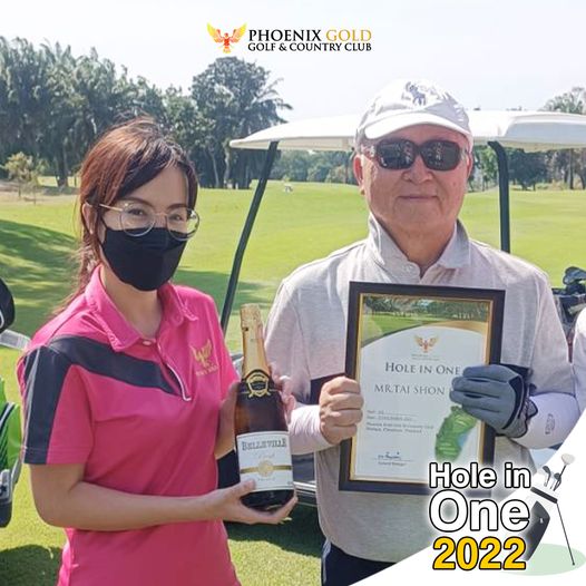 Phoenix Gold Golf amp Country Club 2 people people standing and text Phoenix Gold Golf amp Country Club 2 people people standing and text
