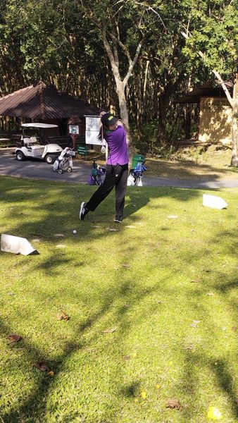 Wangjuntr Golf Park 3 people and grass Wangjuntr Golf Park 3 people and grass