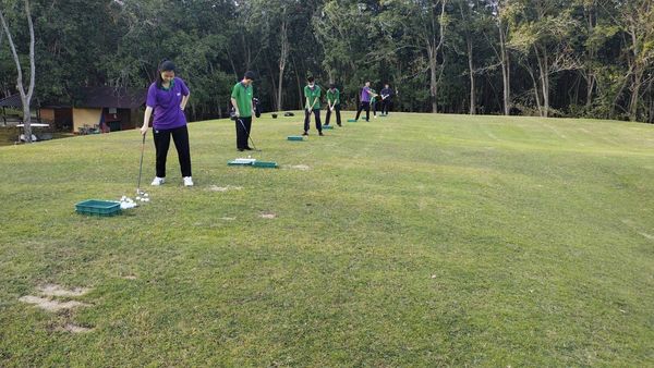 Wangjuntr Golf Park 7 people people standing and grass Wangjuntr Golf Park 7 people people standing and grass