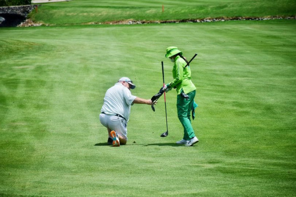 Amata Spring Country Club 2 people people playing sports grass and golf course