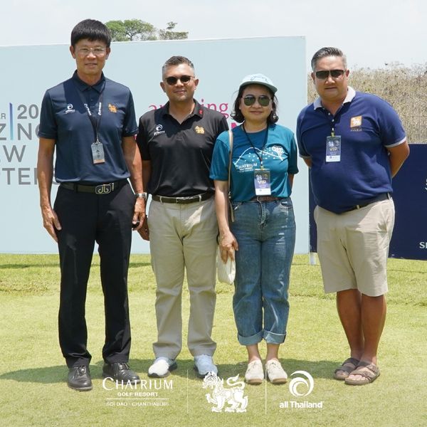 Chatrium Golf Resort Soi Dao Chanthaburi 4 people people standing and grass