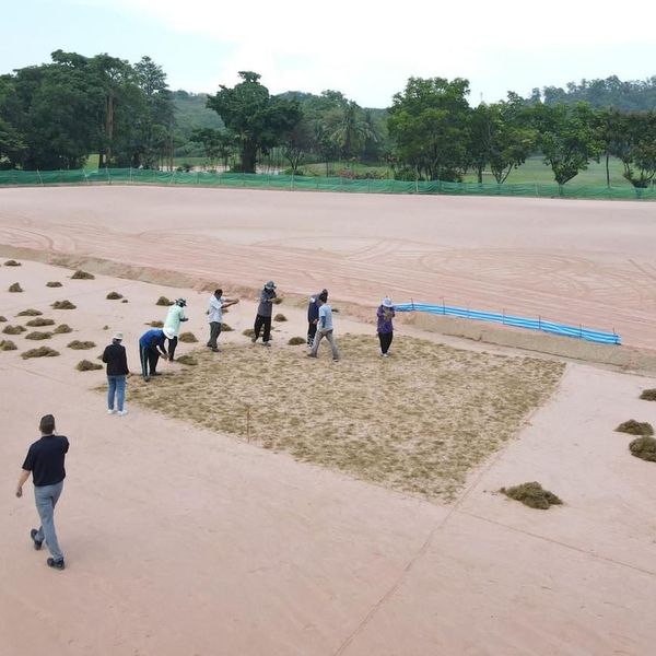 Burapha Golf amp Resort Thailand 8 people beach and grass