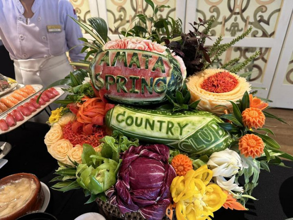 Amata Spring Country Club 1 person watermelon and text