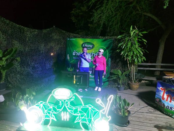 ศูนย์พัฒนากีฬา สอ รฝ ACDC Golf Course 2 people lighting and text