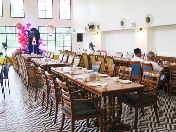 Eastern Star Country Club amp Resort 2 people and table