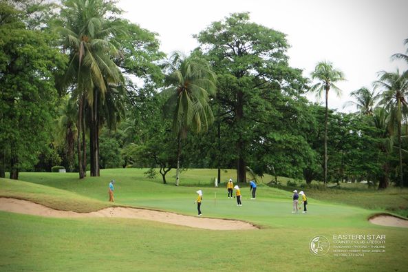 Eastern Star Country Club amp Resort 8 people people golfing golf course and text