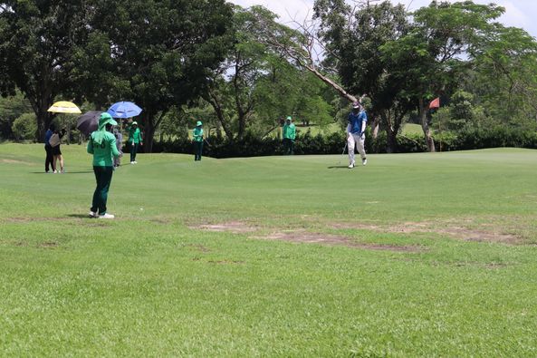 Greenwood Golf Club 7 people people golfing and golf course