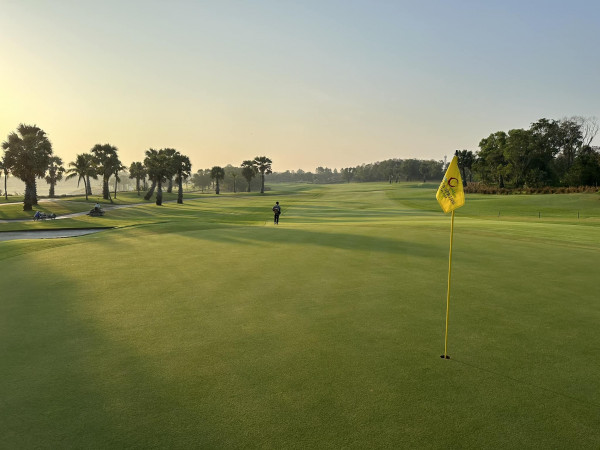 Amata Spring Country Club nbsp 1 person golfing golf cart and golf course