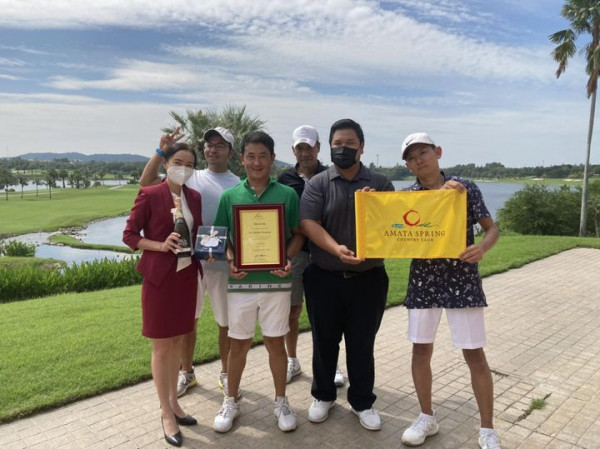 4 people people standing and golf course