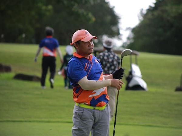 2 people people golfing and grass 2 people people golfing and grass