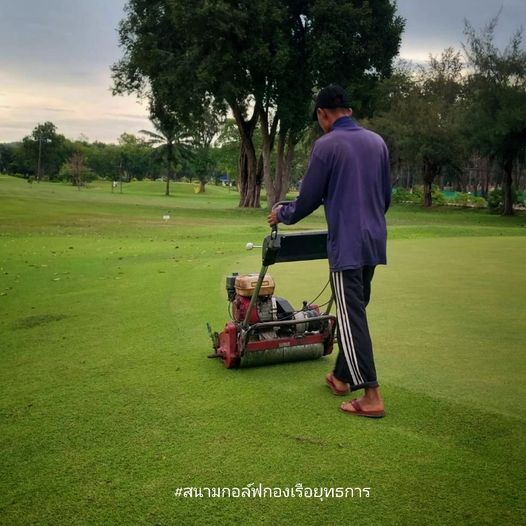 1 person grass and golf course 1 person grass and golf course