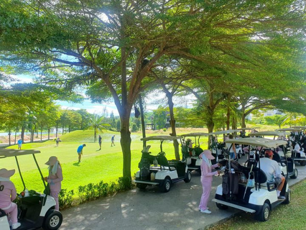 Rayong Green Valley Golf 9 people grass and tree